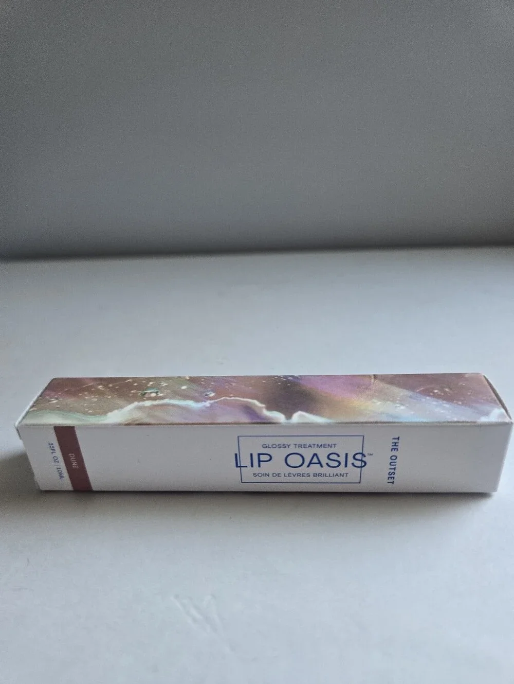 The OUTSET Lip Oasis Glossy Treatment color Dune